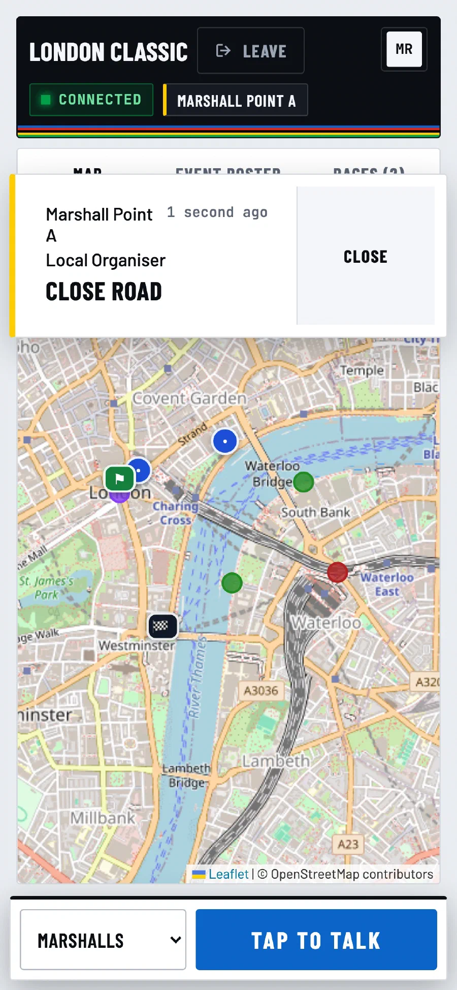 A marshal's phone showing an incoming Close Road message from the organiser over the live map.